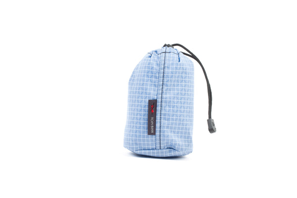 A Size 1 Tidal (light blue with white grid) 200 Halcyon Travel Stuff Sack.